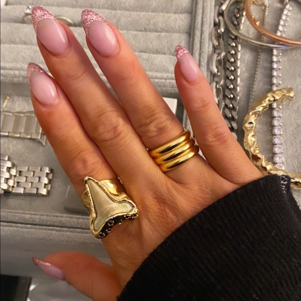 Shark tooth and black diamond ring